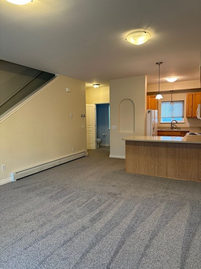 Photo - NEW CARPET THROUGHOUT| 2-Bedroom Townhome with Garage