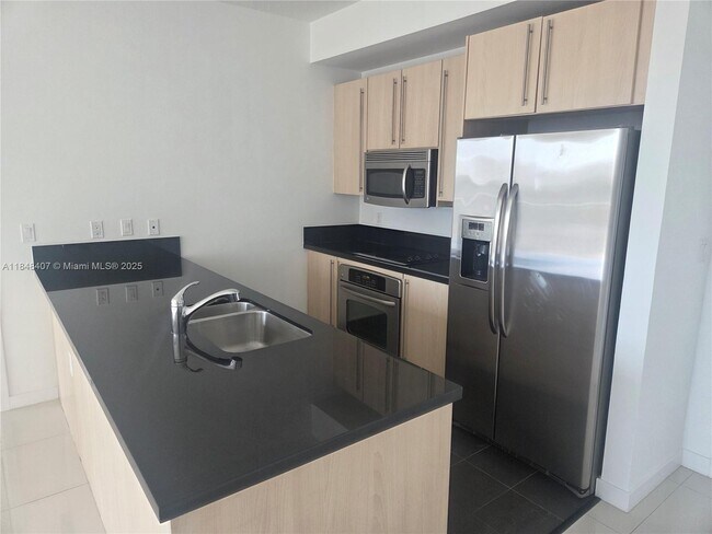 Photo - 79 SW 12th St Unidad 1004-S