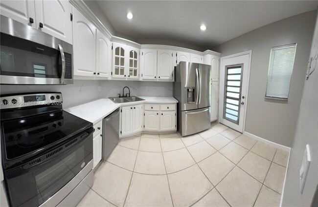 Building Photo - 3360 Spanish Moss Terrace Unit 211