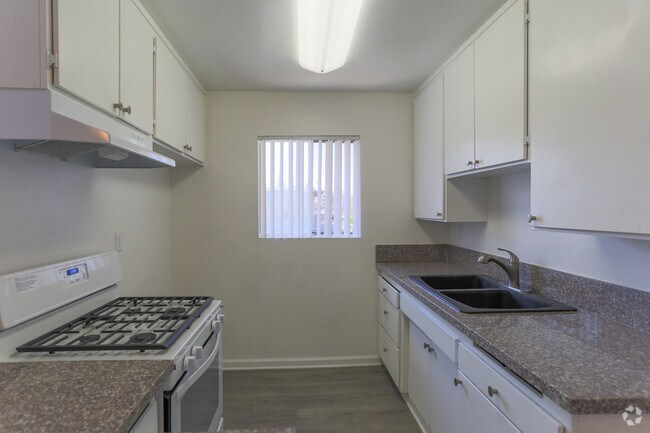 1*1: Área de la cocina - University Gardens Apartments