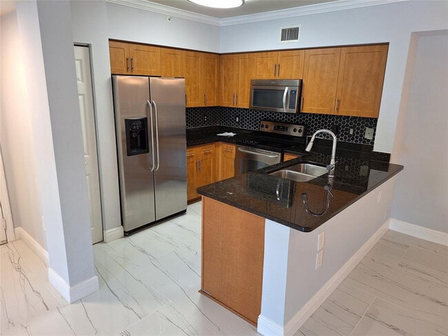 Building Photo - 6492 Emerald Dunes Dr Unit 108