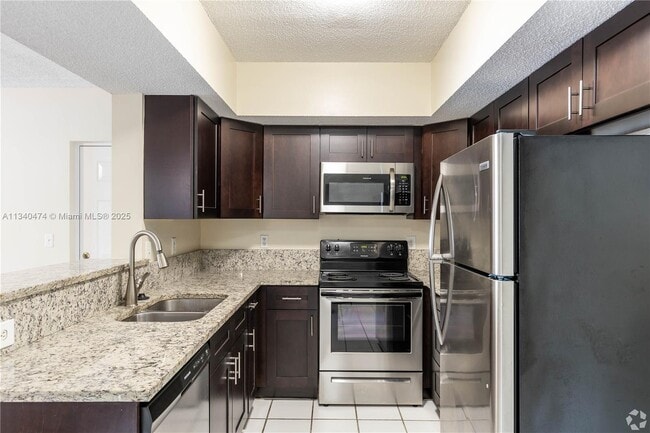 Building Photo - 5640 NW 61st St Unit 1408 Rental