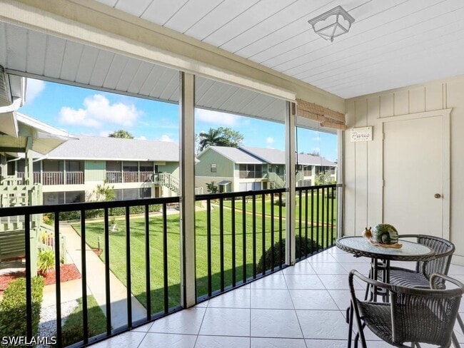 Building Photo - 4912 Tamiami Trl E Unit 209