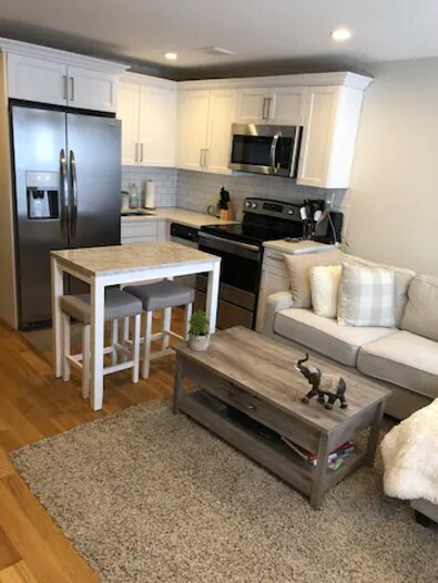 Living Area - 97 Somers St Townhome
