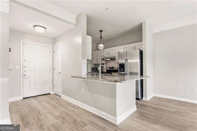 Building Photo - 2700 Pine Tree Rd NE Unit 2303