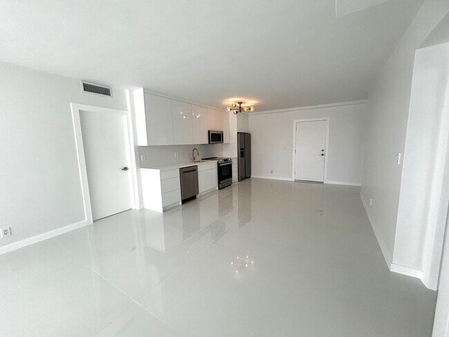 Photo - Fully Renovated East-Facing 2BR/2BA + Bonus Room | Ocean Views | In-Unit W/D Unit 401