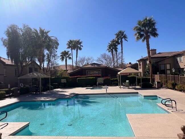 Photo - Gated Community / Community Pool / Luxury Vinyl Planking Throughout