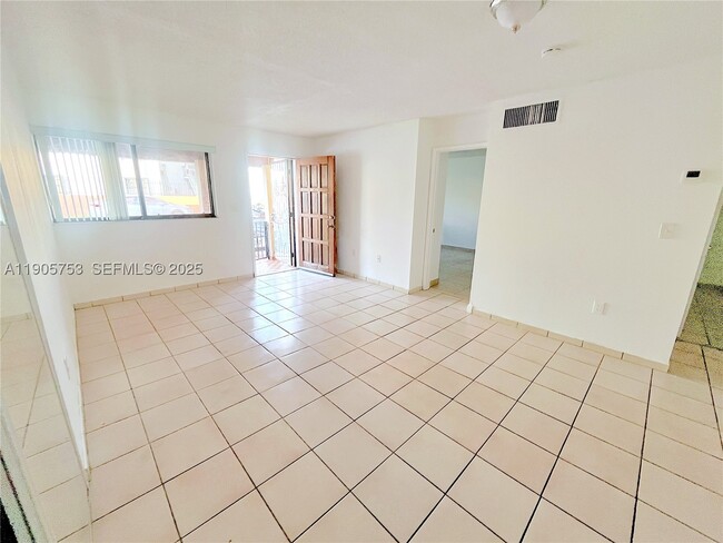 Building Photo - 2740 W 63rd St Unit 104