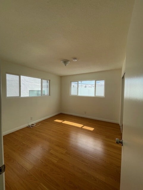 1st Bedroom with 2 large windows - 5462 Barton Ave Unit 6