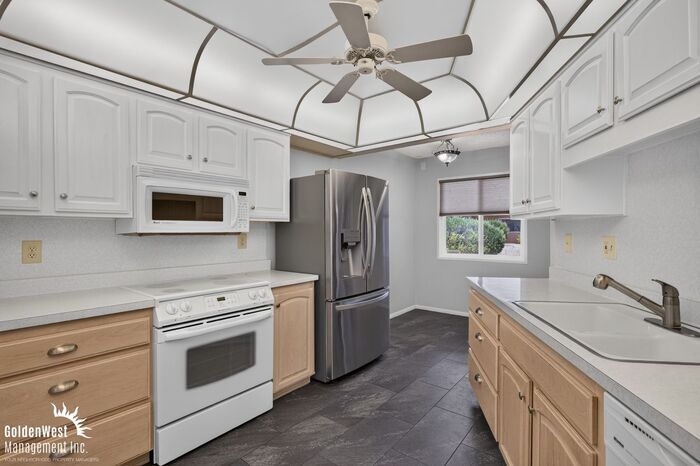 Spacious 2Bdm 2Ba Sun City Home with Vaulted Ceilings, Private Covered Patio & Garage - LOCATED I...