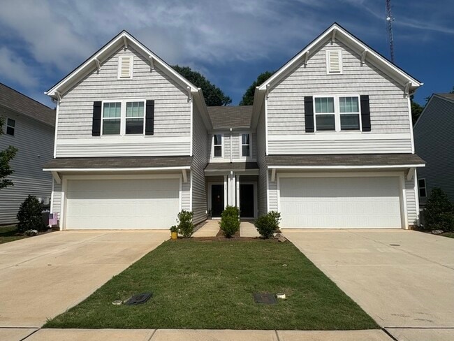 Building Photo - Three bedroom 2 1/2 bath townhome with att...