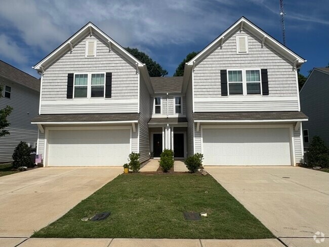 Building Photo - Three bedroom 2 1/2 bath townhome with att...