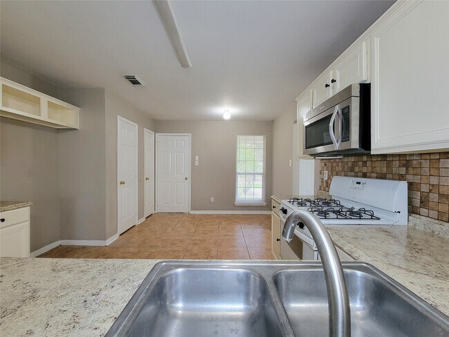 5322 Rivergate Dr