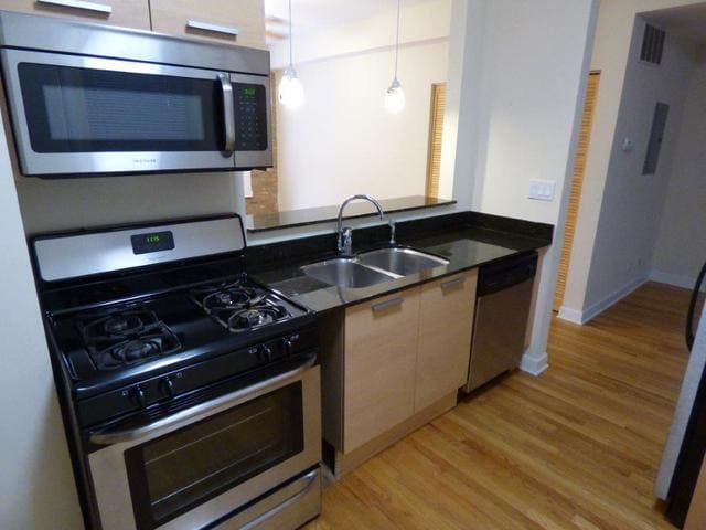 Building Photo - 1336 W Estes Ave Unit 1 Rental