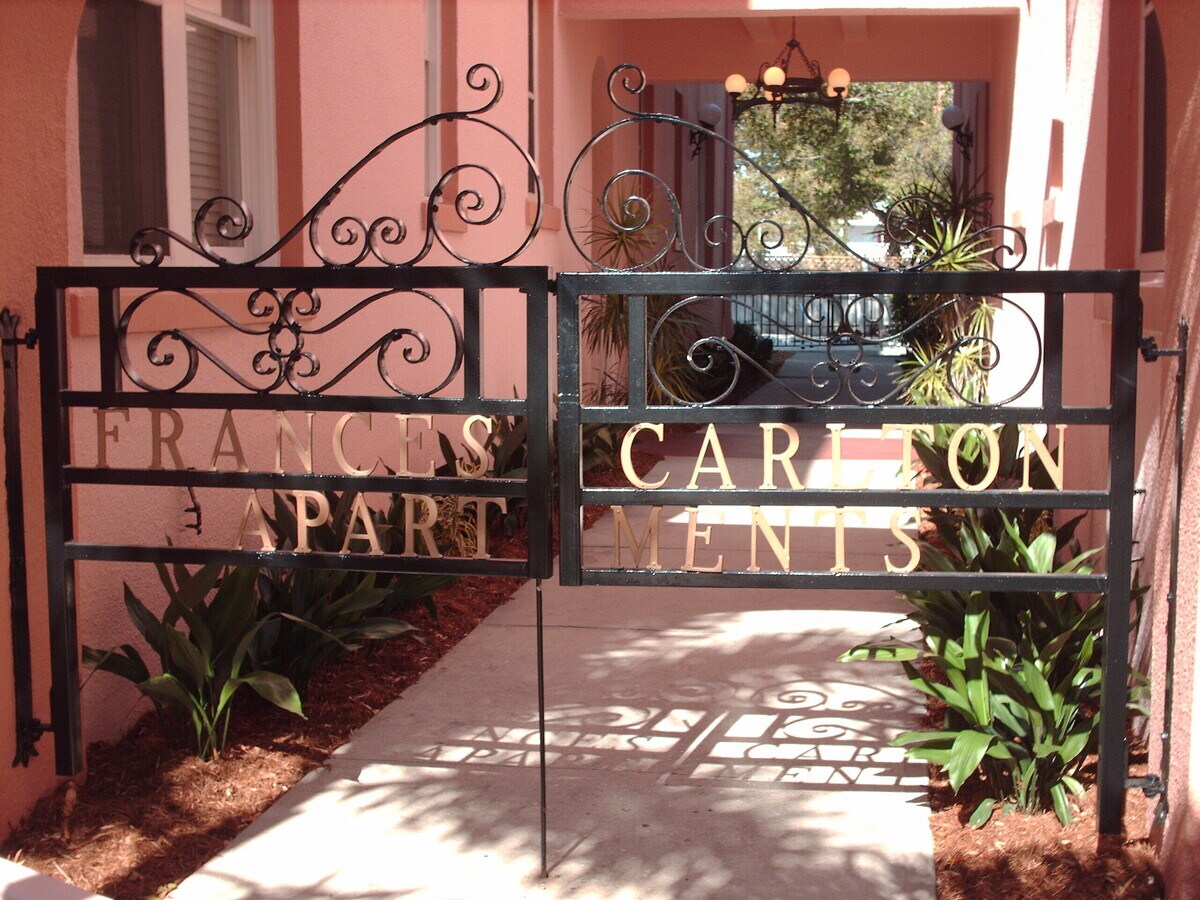 View of entrance into main courtyard - Frances Carlton Apartments