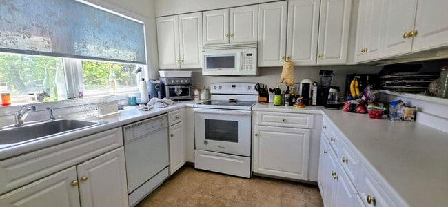 Photo - NO FEE! 2K Sq Ft. Pet Friendly Duplex w 2 Parking Spots near Boston Landing!  Secured Basement w ...
