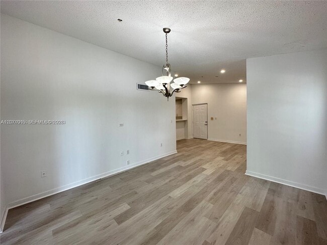 Building Photo - 4560 NW 107th Ave Unit 301-12