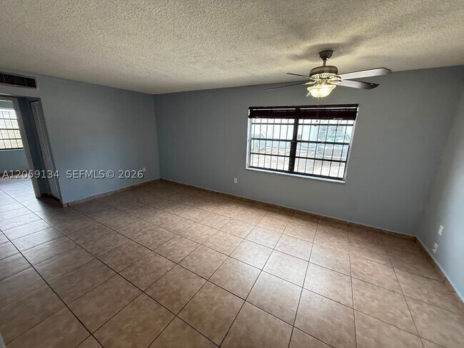 Photo - 1325 W 68th St Unit 111