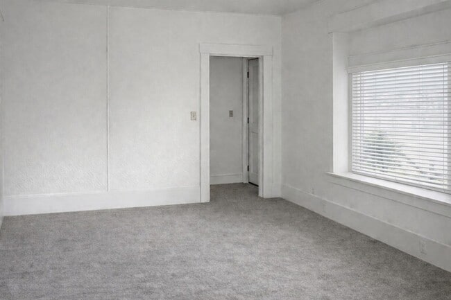 Side entry, living room, to stairs - 2000 Iron St