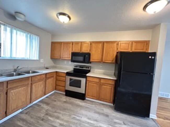 Photo - ** Move in Special** Spacious 3 bedroom, 1 bath Lakewood duplex with fenced in backyard available! Unit 87 Newland Street