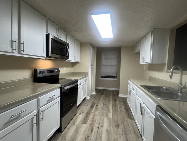 Photo - Remodeled townhome! 2 story with loft & 2 ...