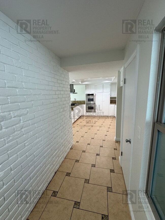 Photo - Spacious Single-Story 7-Bedroom Home with Open Layout & Abundant Natural Light