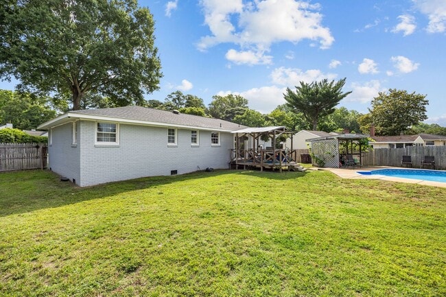 Photo - Spacious 4-Bedroom Home with Saltwater Pool & Large Fenced Yard
