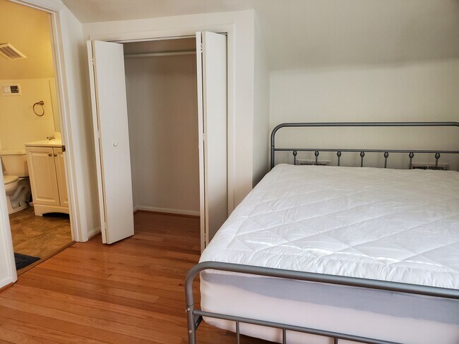 Bedroom includes queen-sized bed - 2509 10th St NE