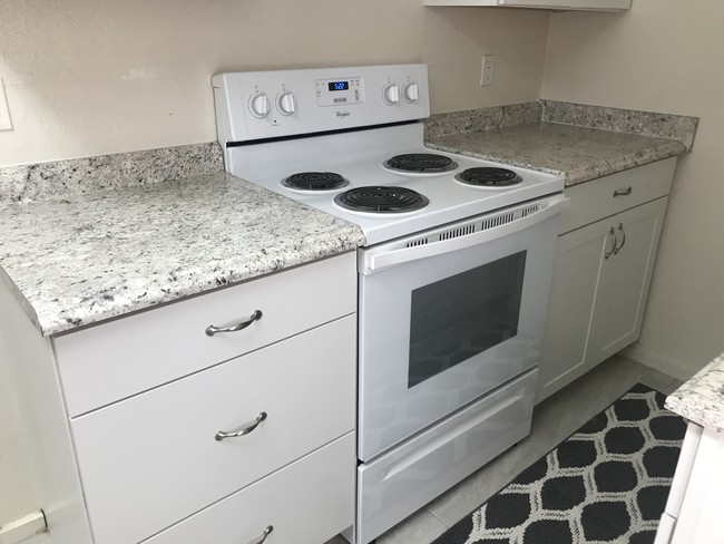 New Cabinets & Stove - 1131 5th St SW Apartment Unit 5 Upstairs