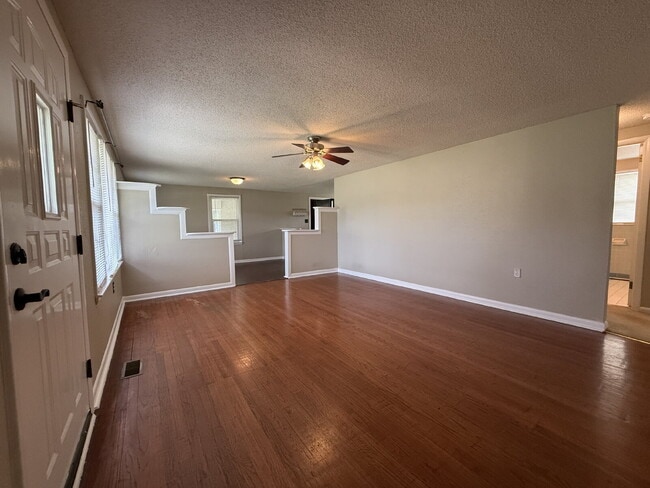 Photo - "Charming 4-Bedroom Home with Hardwood Floors on Ready Section Road!"