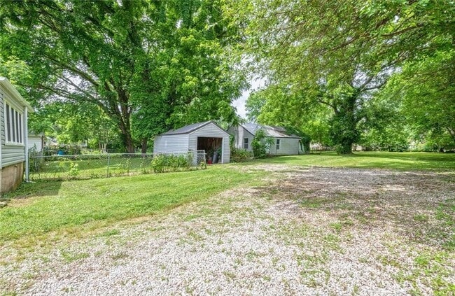 Photo - Home with a fence