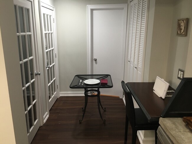 Separate dining alcove with 3 closets; walk-in cedar closet, large pantry, storage closet w/ shelves - 415 9th St Unit #1