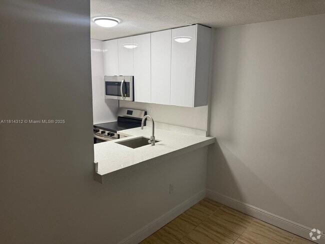 Building Photo - 496 NW 165th St Unit D-210 Rental