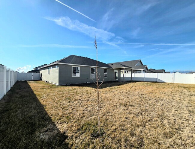 Photo - New 4 Bed Rambler | Fenced Yard | 2-car Garage | Move-In Ready House for Rent in Quincy!