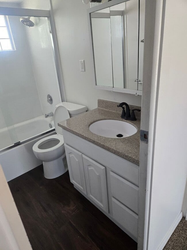 Photo - 2 Bedroom Home with Fenced Yard & Updated Flooring in Kitchen/Bath