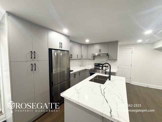 Photo - All-Inclusive 2-Bedroom Basement Apartment with 2 Parking Spaces – Hamilton Unité 2