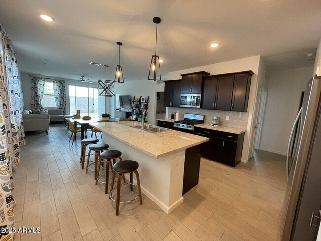 Building Photo - 40629 W Sunland Dr