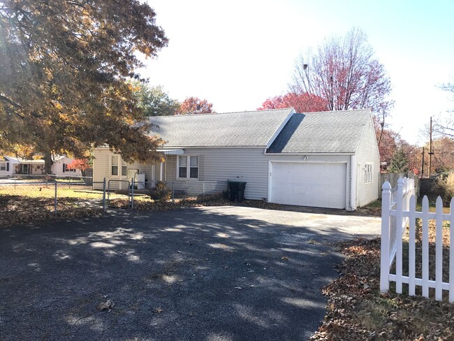 Charming home with a one car attached garage. - Charming home with a one car attached garage.