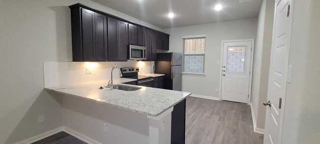 Photo - Gorgeous 3/2.5 on cul-de-sac in Cibolo with primary bedroom downstairs.