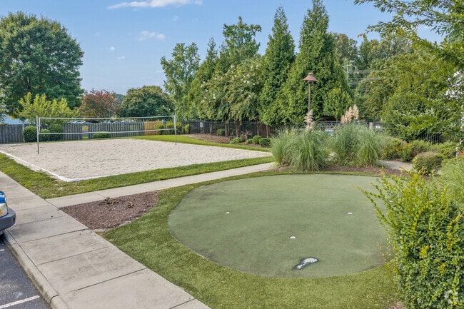 Cancha de voleibol, putting green