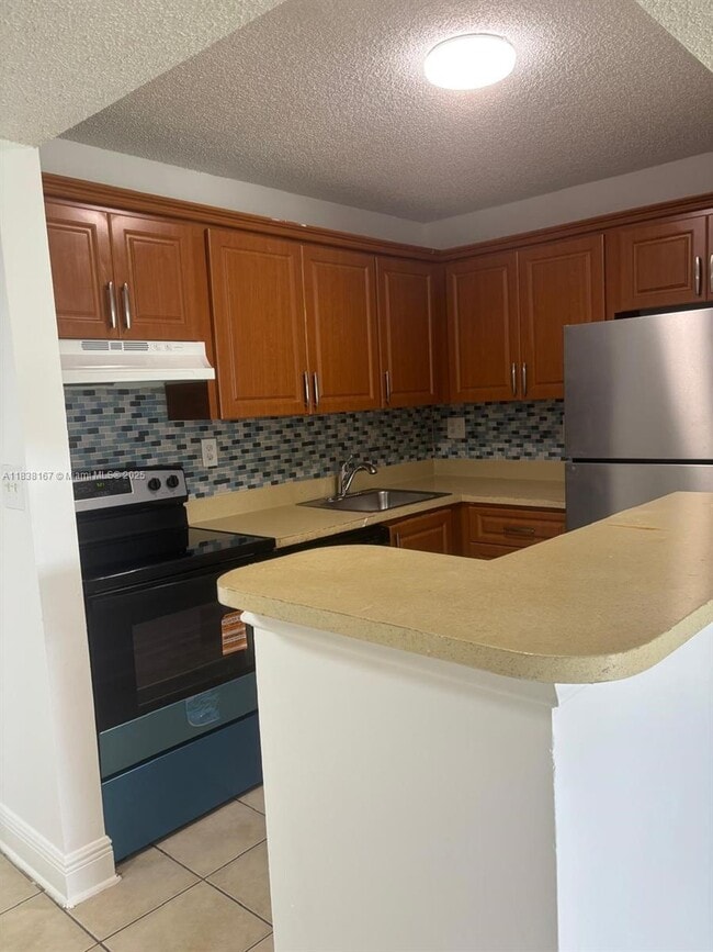 Photo - 7110 NW 179th St Condo Unit 211