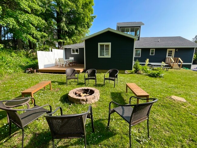 Backyard with shared firepit - 6023 Barnhart Rd Unit Marina Lake House  2