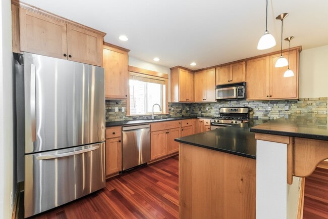 Photo - Bright and Spacious Residence with Vaulted Ceilings and Garage