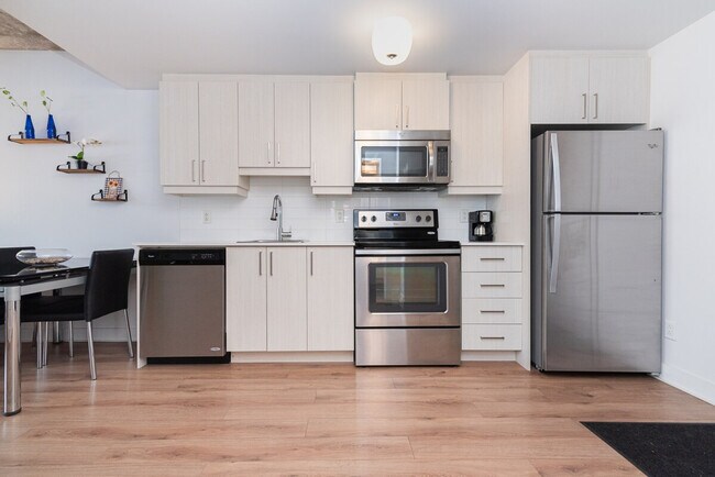 Photo - 201 Rue Sainte-Catherine E Unit ID1261767P