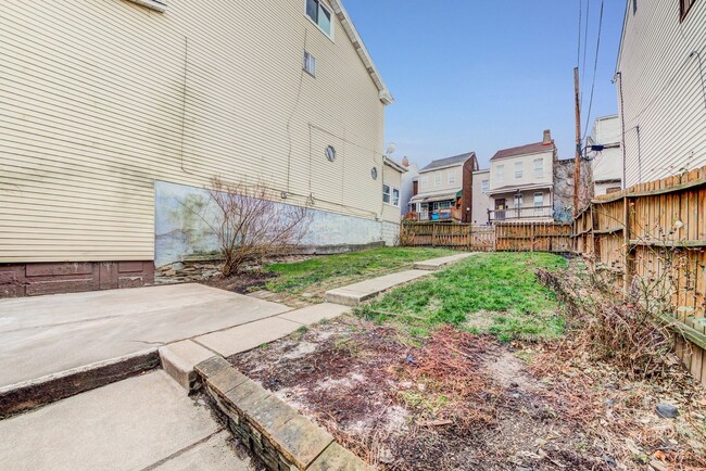 Photo - AVAILABLE JUNE 2026 -  4 Bedroom Full Renovation w/ Stunning Hilltop View & Central AC!