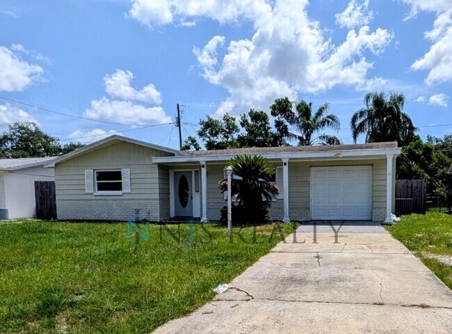 Photo - Newly renovated 3/1/1 NEW flooring, NEW paint, updated kitchen & bath, fenced yard.. a MUST SEE!!