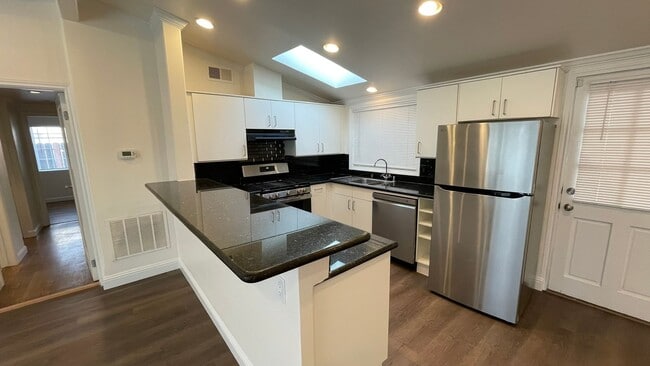 Photo - Beautiful 3 bedroom 2 bathroom home, updated kitchen & baths plus 1 car garage!