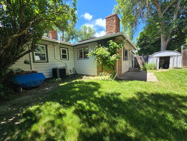 Photo - Spacious 4 Bedroom Home with Solar Panels, Fully Fenced Yard on Rimrock Rd