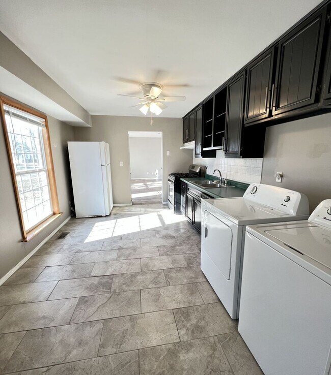 Photo - Charming Ranch Home with Flexible Space and Private Backyard