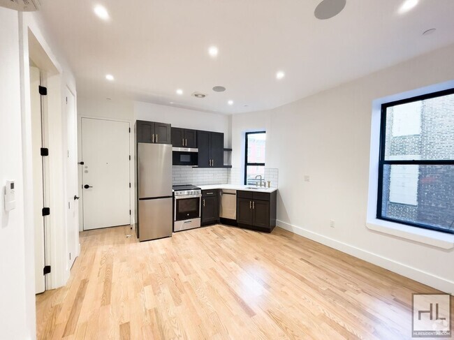 Building Photo - Spacious 4-Bed 2.5 Bath / New Boutique Dev... Unit 3B Rental